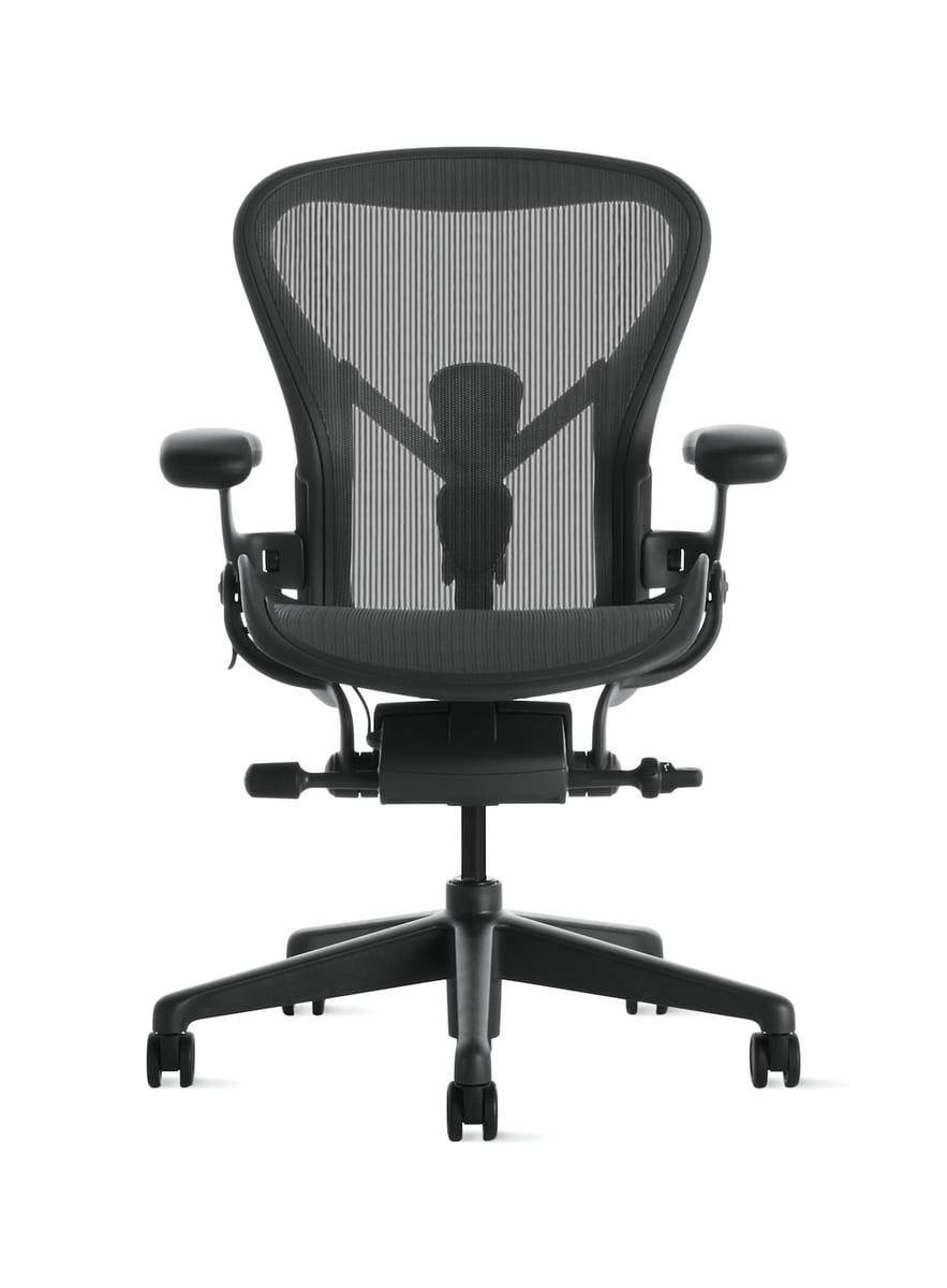 Herman Miller x Logitech G Embody premium ergonomic gaming chair on a hardwood floor
